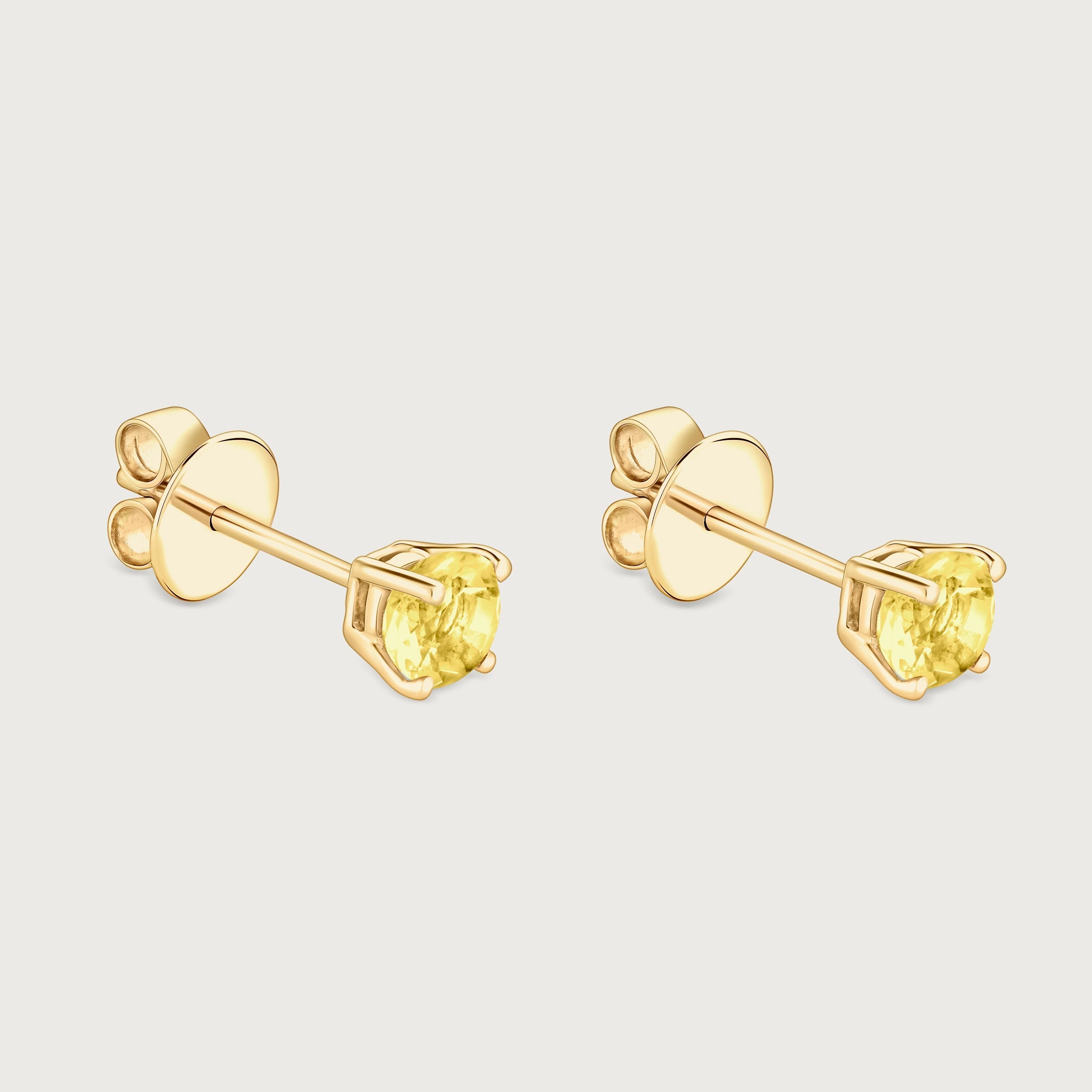 Boucle d'oreille à clou en saphir jaune