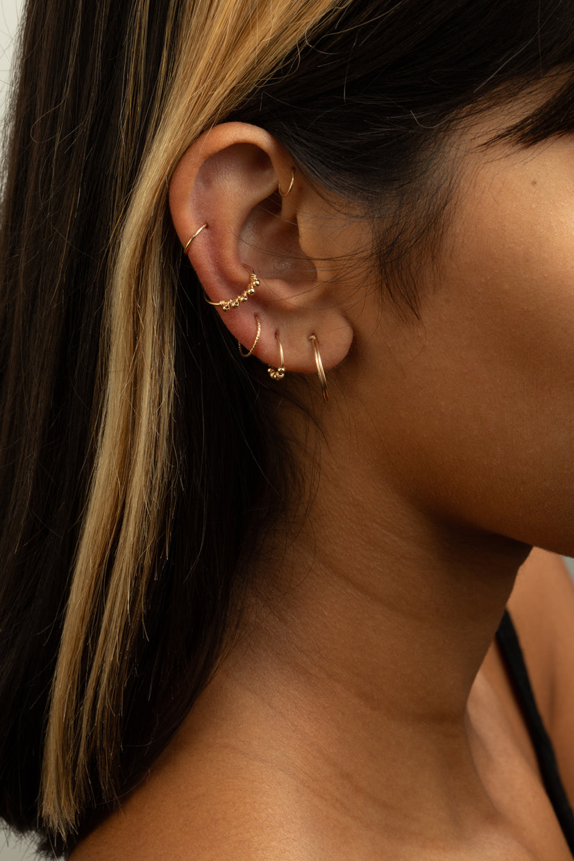 Anneau piercing en or jaune 18 carats