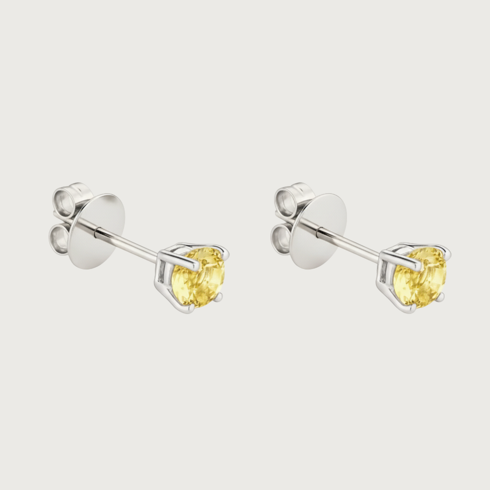 Boucle d'oreille à clou en saphir jaune